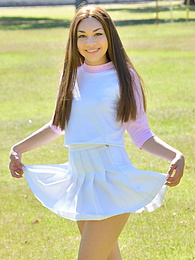 Find-Best-Teens.com presents: Sexy youthful Kelly Kitten in skirt revealing small tits and toying her cunt outside